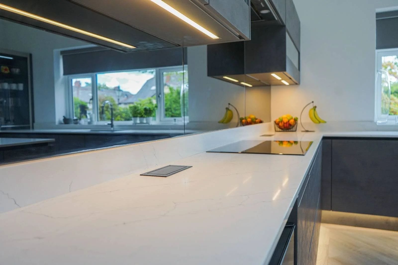 White kitchen worktops on black cabinets